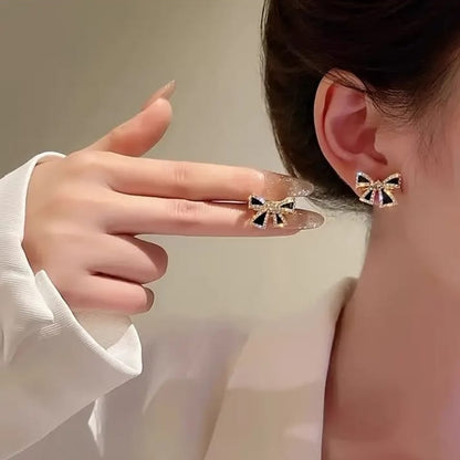 Stylish Black Golden Bow Earrings – A Fashion Statement